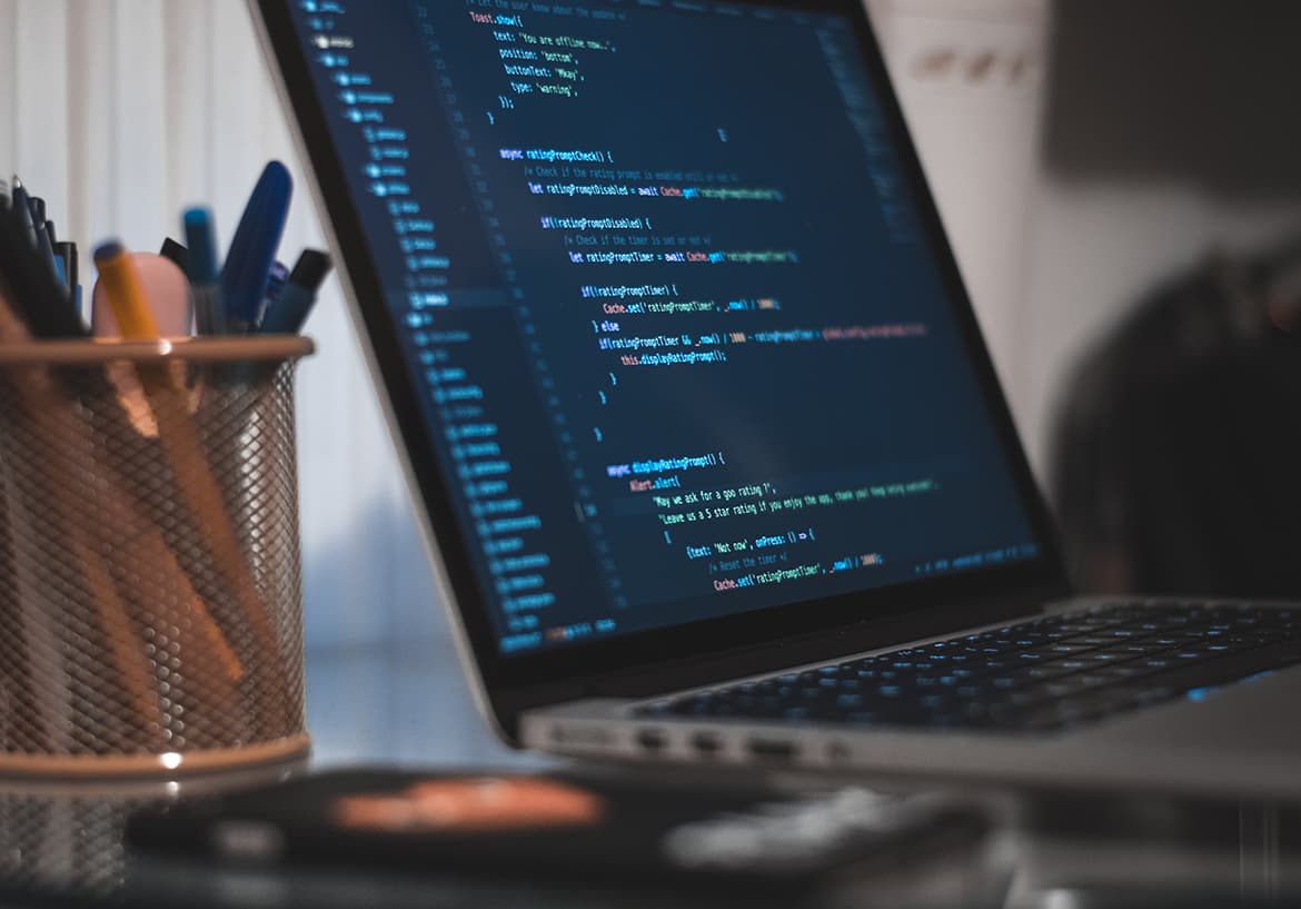 A laptop with a code editor open
