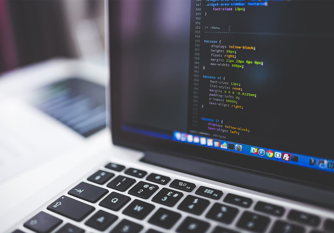 A laptop with a code editor open